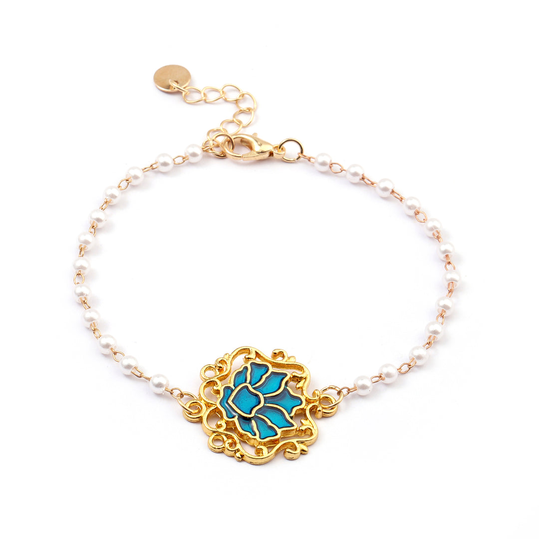 Serenity Lotus Blue Charm Gold Bracelet