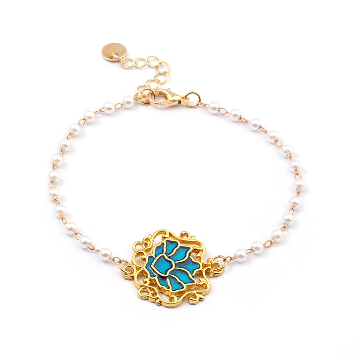 Serenity Lotus Blue Charm Gold Bracelet