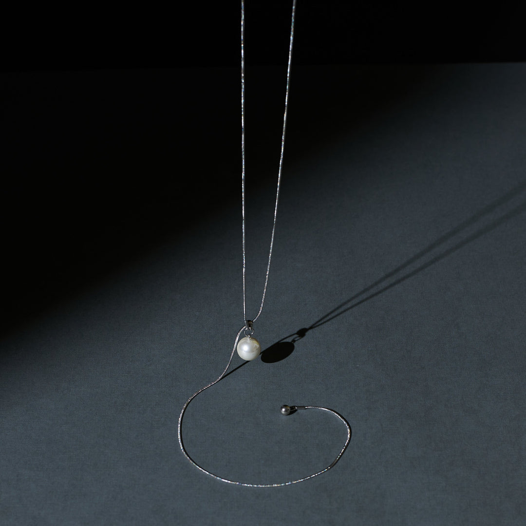 Elegant Silver Swirl Tassel Chain