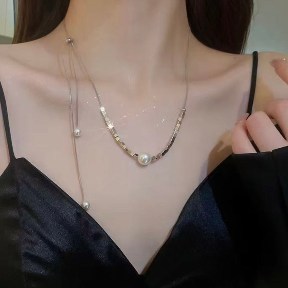 Shimmering Love Knot Pearl Necklace