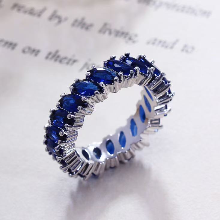 Navy leaf silver tennis ring