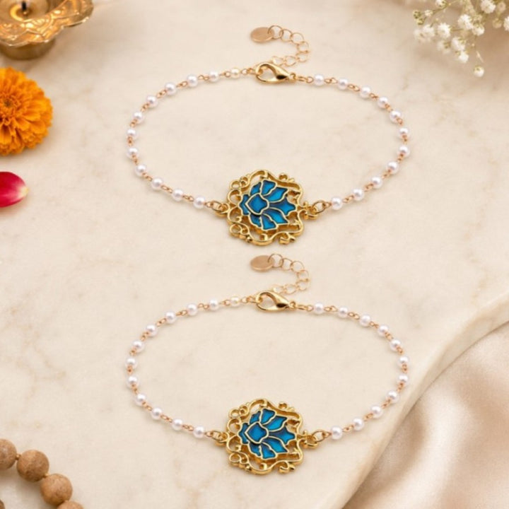 Handcrafted Serenity Blue Lotus Charm Rakhi for Brother - Pack of 2