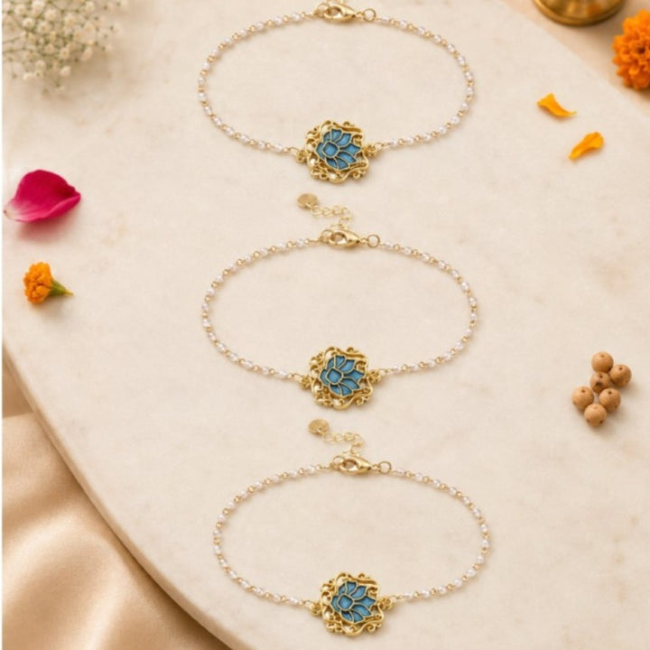 Handcrafted Serenity Blue Lotus Charm Rakhi for Brother - Pack of 3