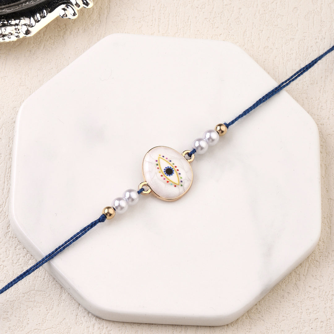 Guardian Gaze Pearl Rakhi - Salty Accessories