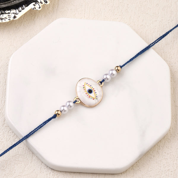 Guardian Gaze Pearl Rakhi