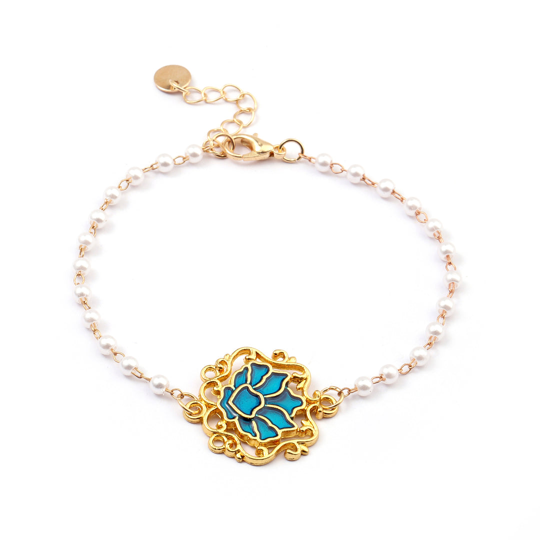 Serenity Lotus Blue Charm Gold Bracelet - Salty Accessories