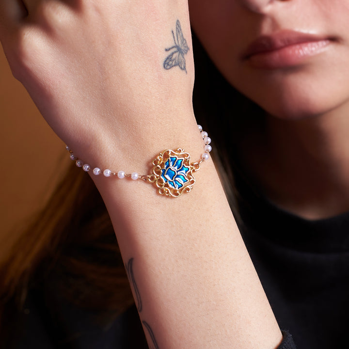 Serenity Lotus Blue Charm Gold Bracelet