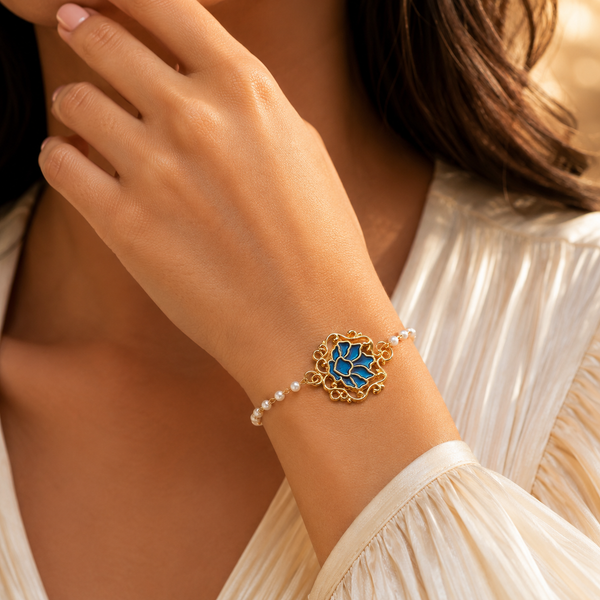 Serenity Lotus Blue Charm Gold Bracelet