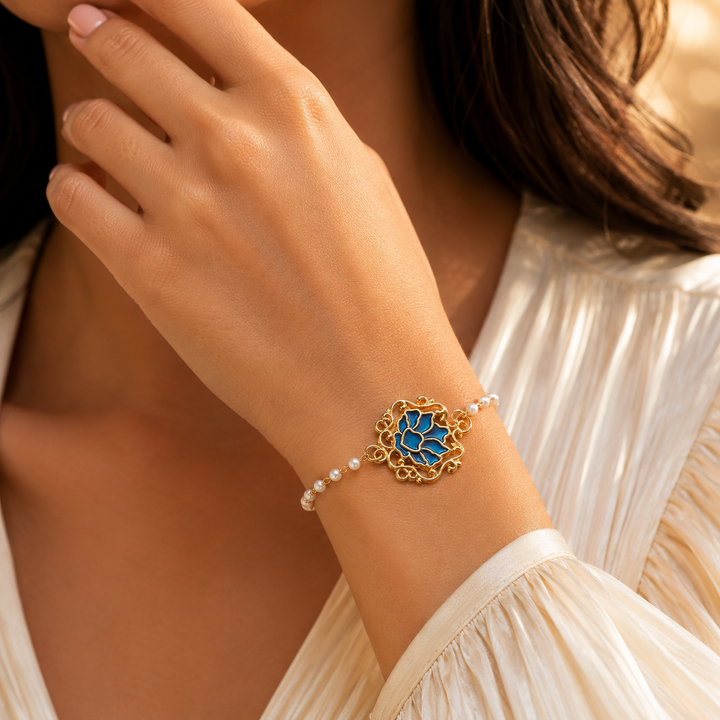 Serenity Lotus Blue Charm Gold Bracelet
