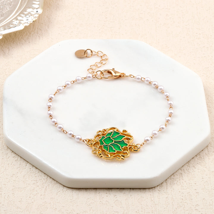 Serenity Lotus Green Charm Gold Bracelet - Salty Accessories