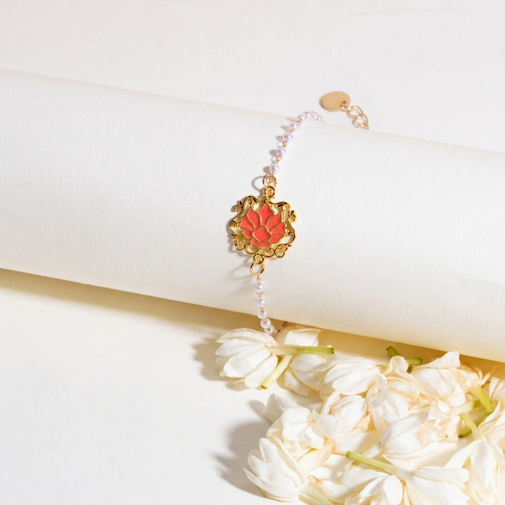 Serenity Lotus Red Charm Gold Bracelet