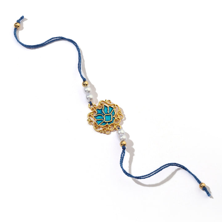 Tranquil Blue Lotus Pearl Rakhi - Salty Accessories