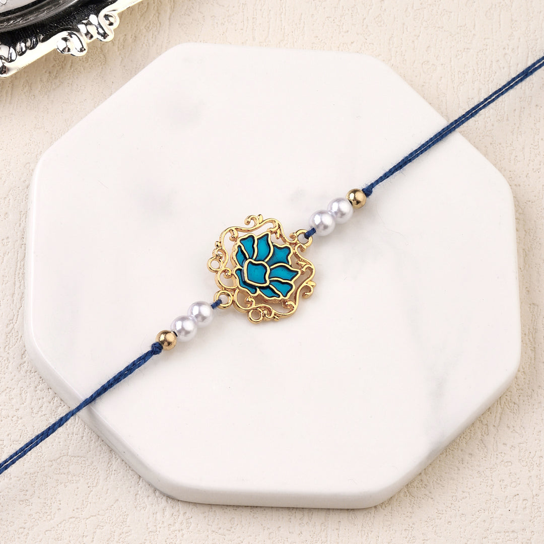 Tranquil Blue Lotus Pearl Rakhi - Salty Accessories