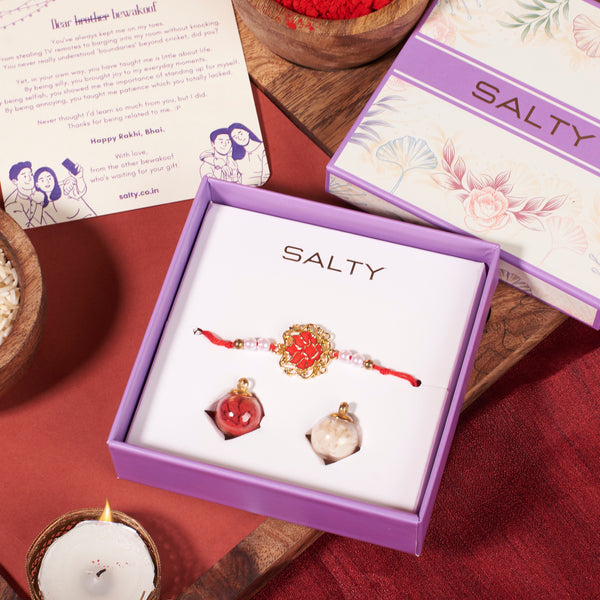 Tranquil Red Lotus Pearl Rakhi
