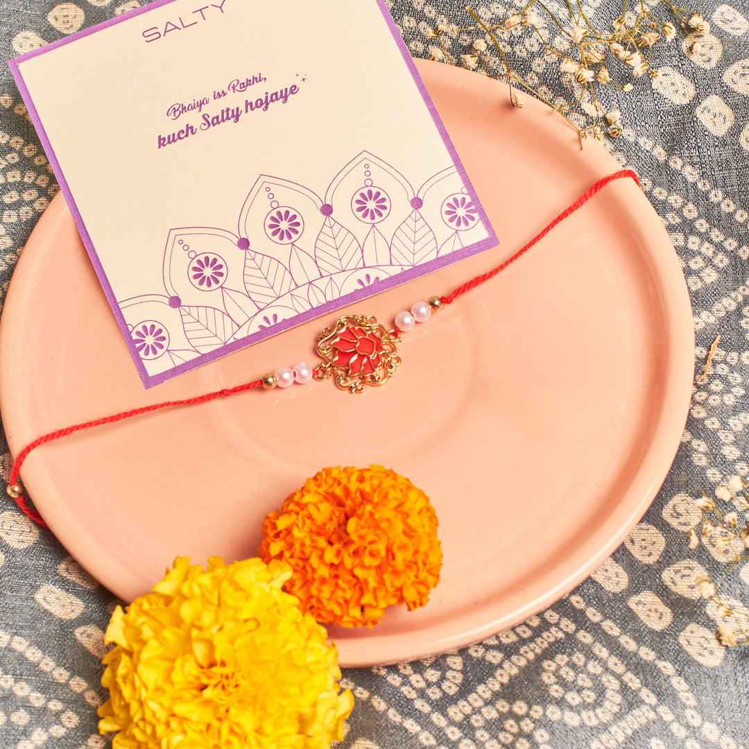 Tranquil Red Lotus Pearl Rakhi