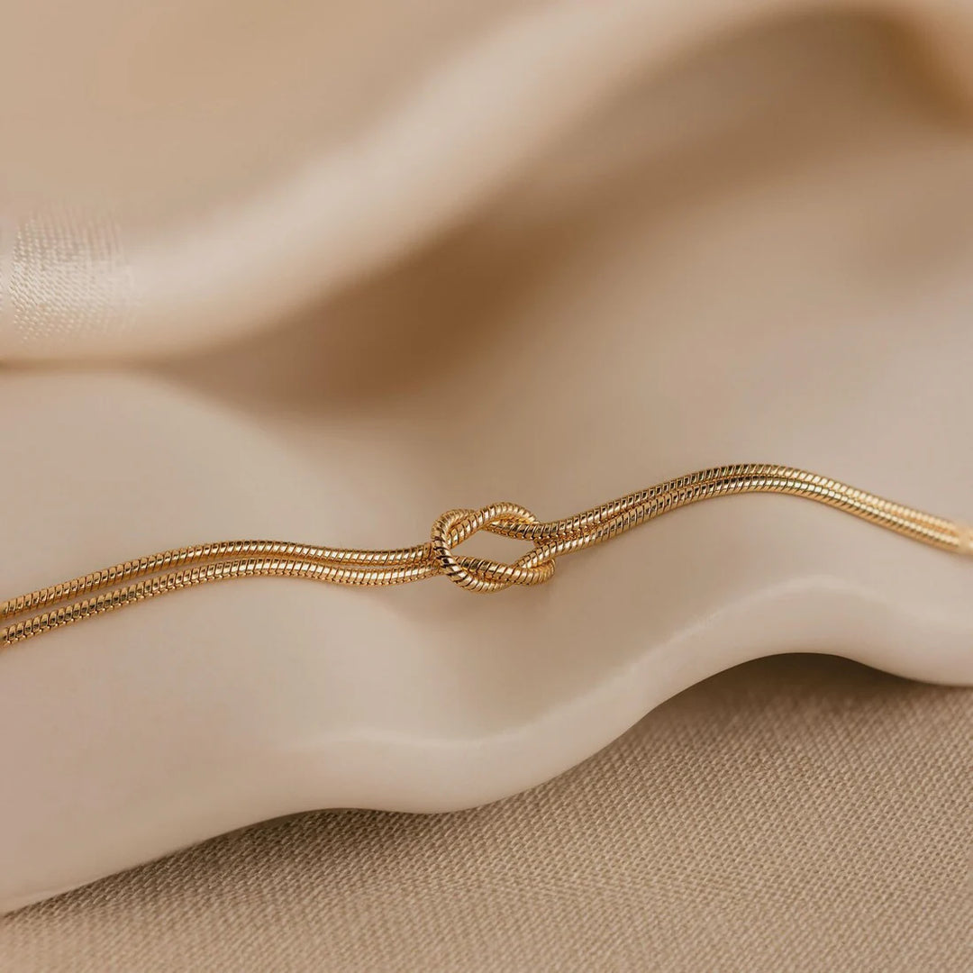 Linked by Love Knot Bracelet - Gold