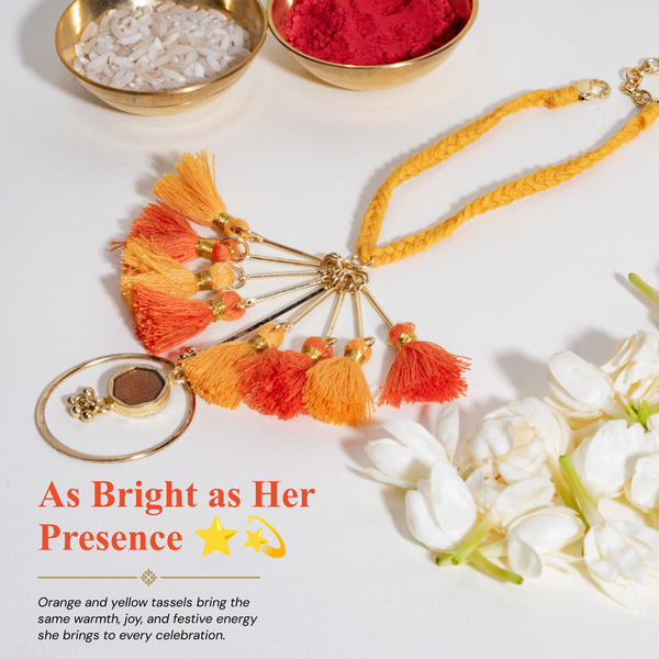 Orange Tassel And Enamel Lumba Bandhan Rakhi For Bhabhi