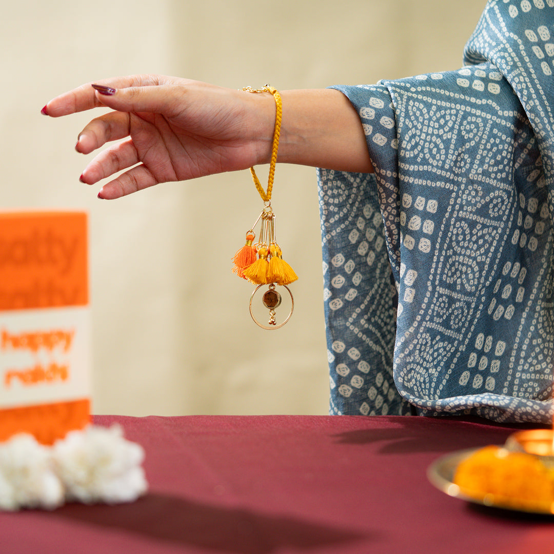 Orange Tassel And Enamel Lumba Bandhan Rakhi For Her
