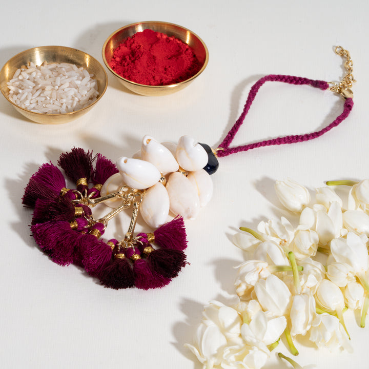 Magenta Tassel And Shell Lumba Bandhan Rakhi For Bhabhi