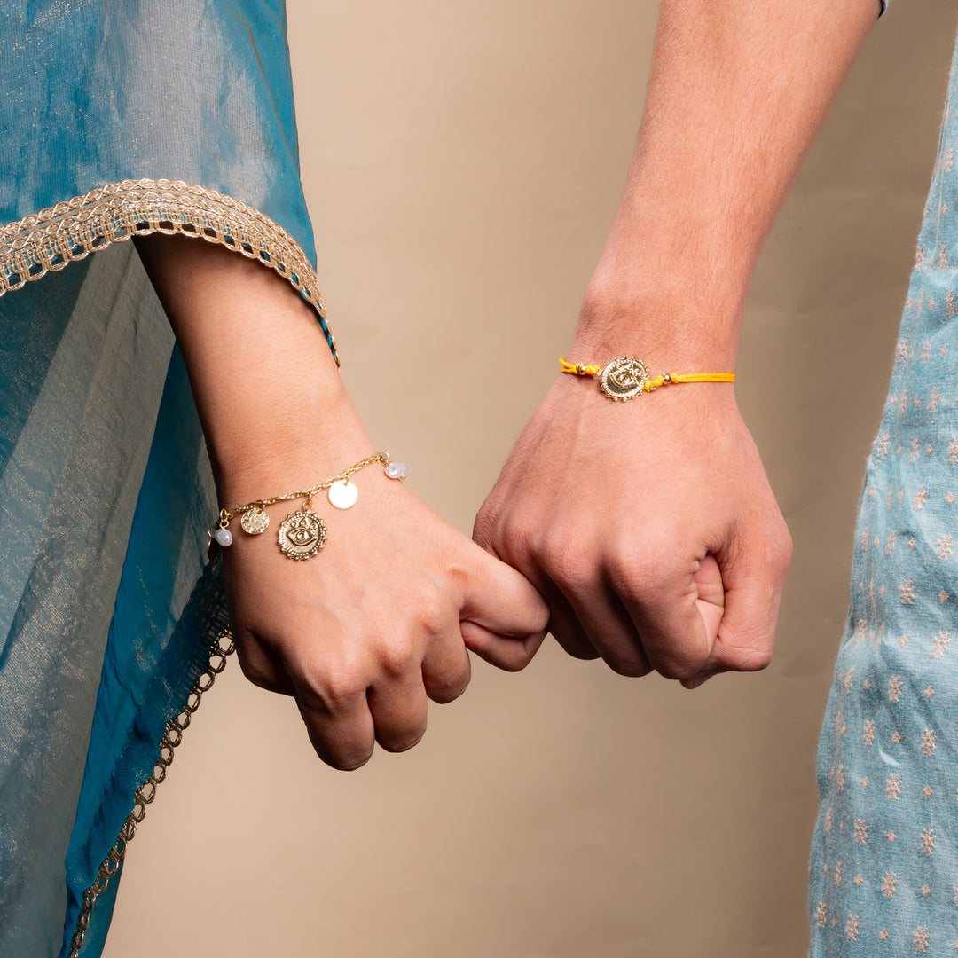 Pearl Evil Eye Gold and Yellow Rakhi Bandhan Rakhi For Bhaiya and Bhabhi