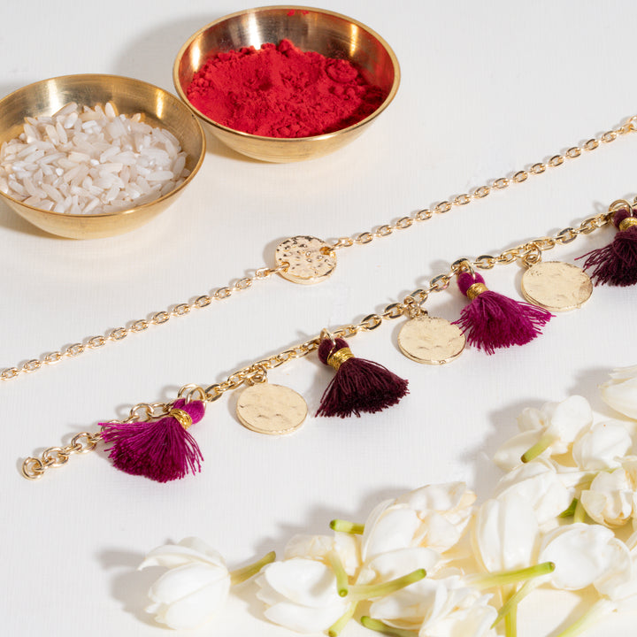 Coin and Tassel Gold and Magenta Rakhi Bandhan Lumba Rakhi For Bhaiya and Bhabhi