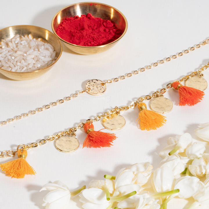 Coin and Tassel Gold and Orange Rakhi Bandhan Lumba Rakhi For Bhaiya and Bhabhi