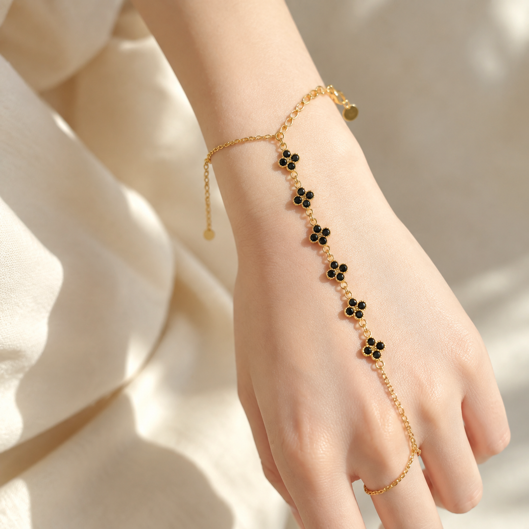 Noir Bloom Clover Gold toned Hand Chain