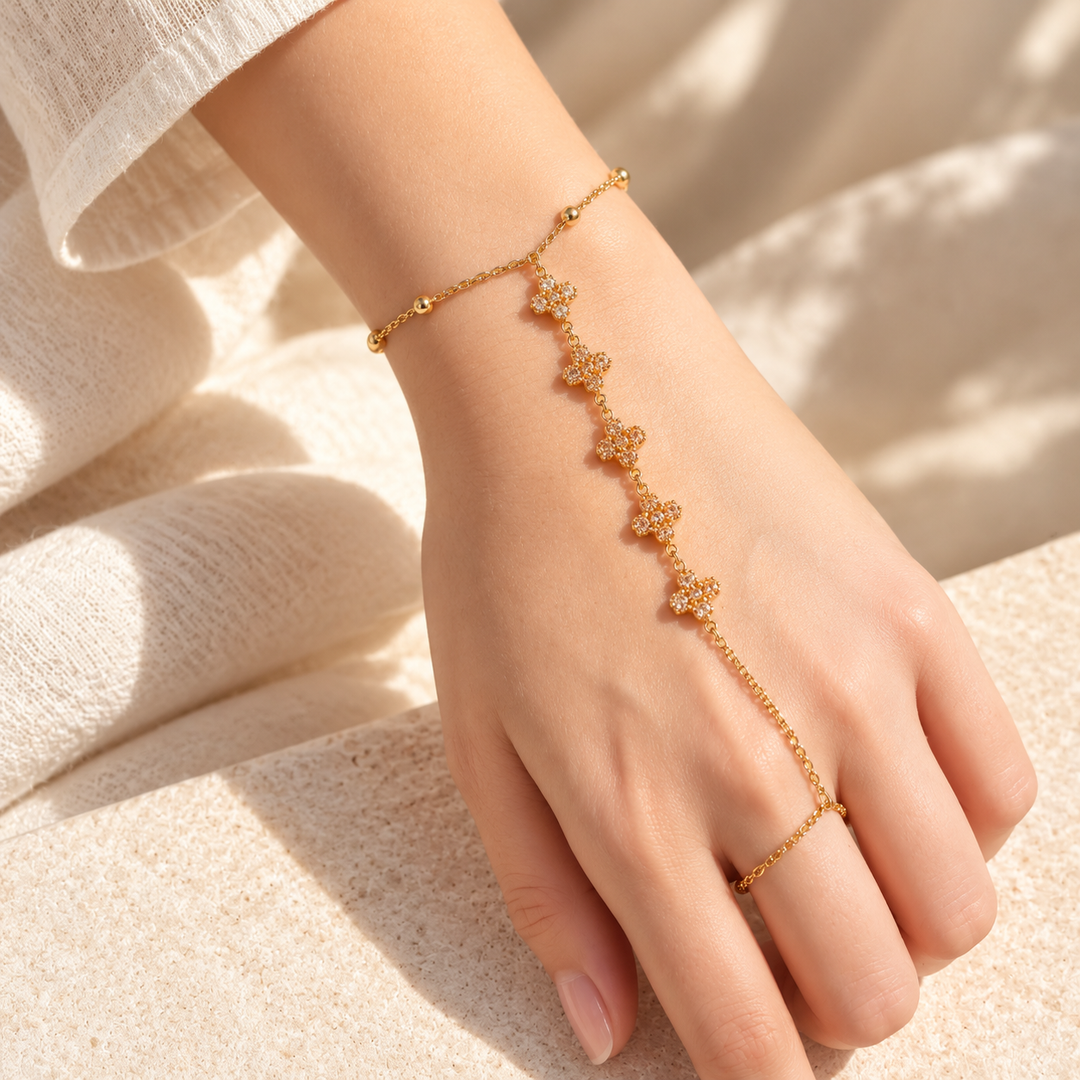 Crystal Bloom Clover Gold toned Hand Chain