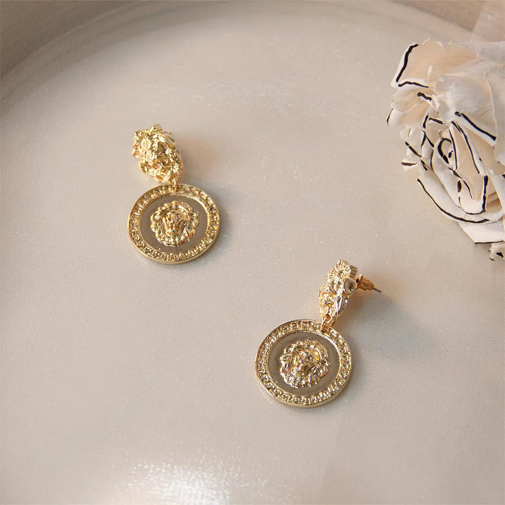 Carved Lion Dented Gold Stud Earrings