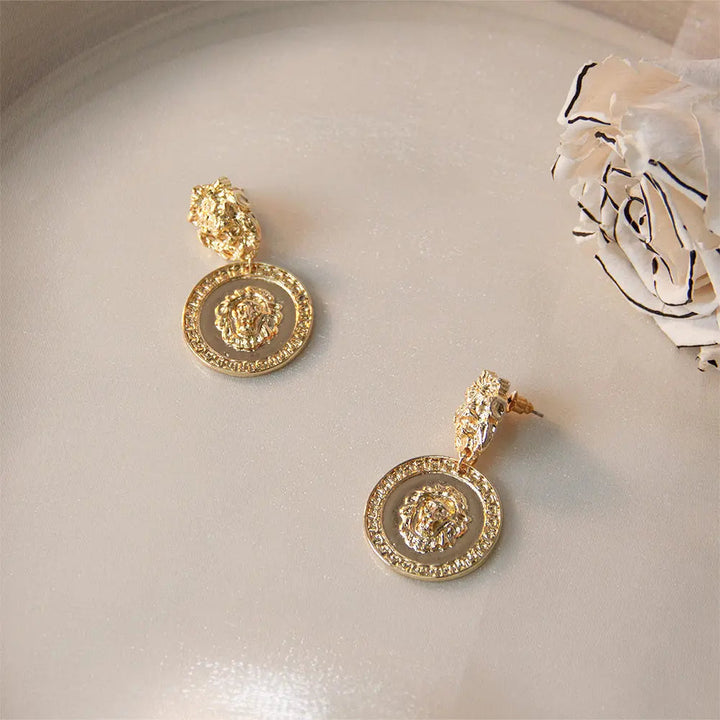 Carved Lion Dented Gold Stud Earrings