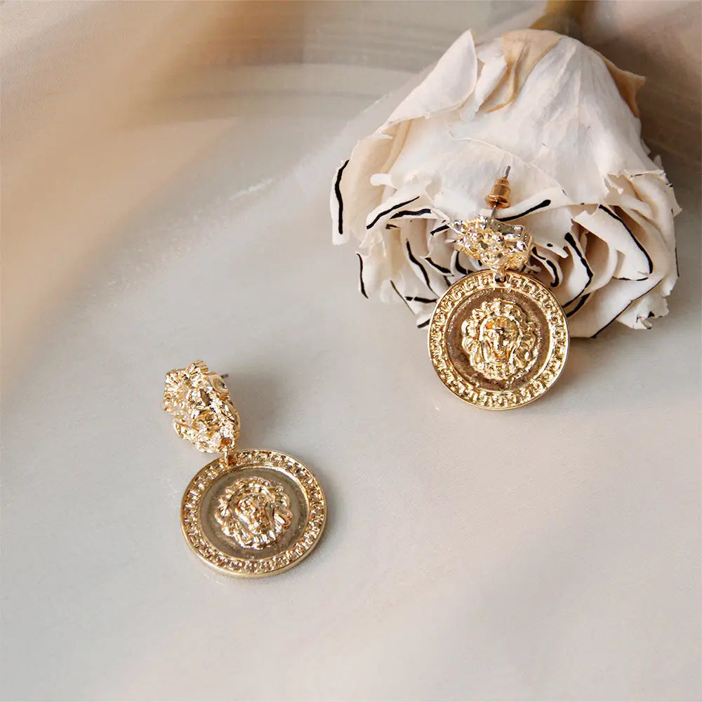 Carved Lion Dented Gold Stud Earrings