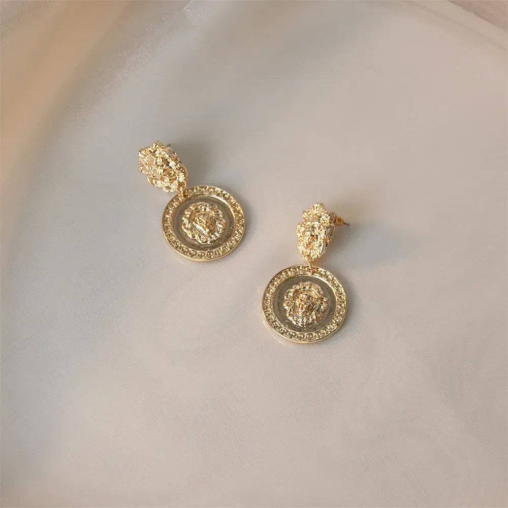 Carved Lion Dented Gold Stud Earrings