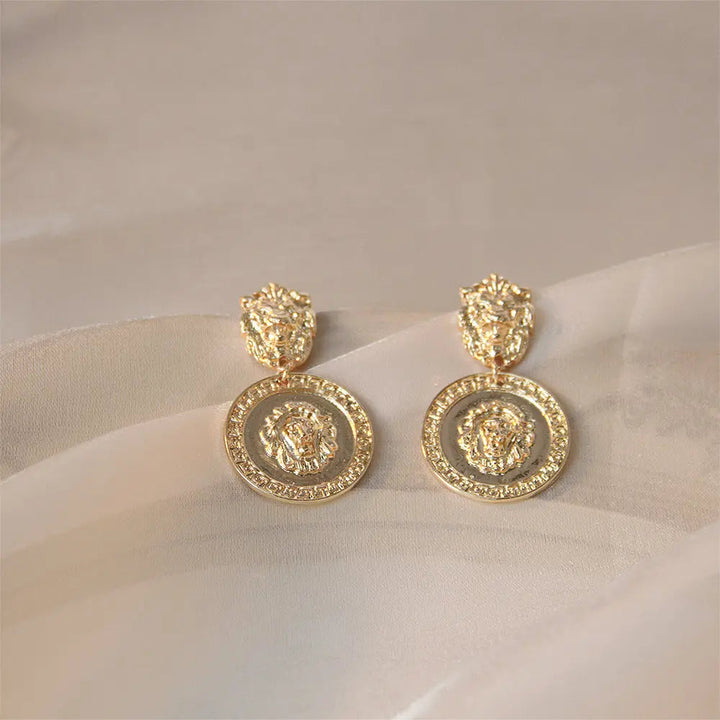 Carved Lion Dented Gold Stud Earrings