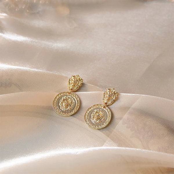Carved Lion Dented Gold Stud Earrings
