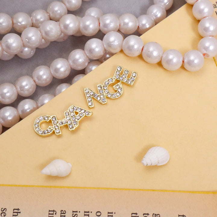 "Change" The World Studs - Salty Accessories