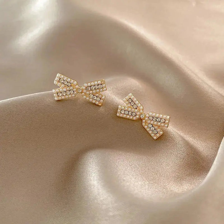 Cross Bow Diamond Studs