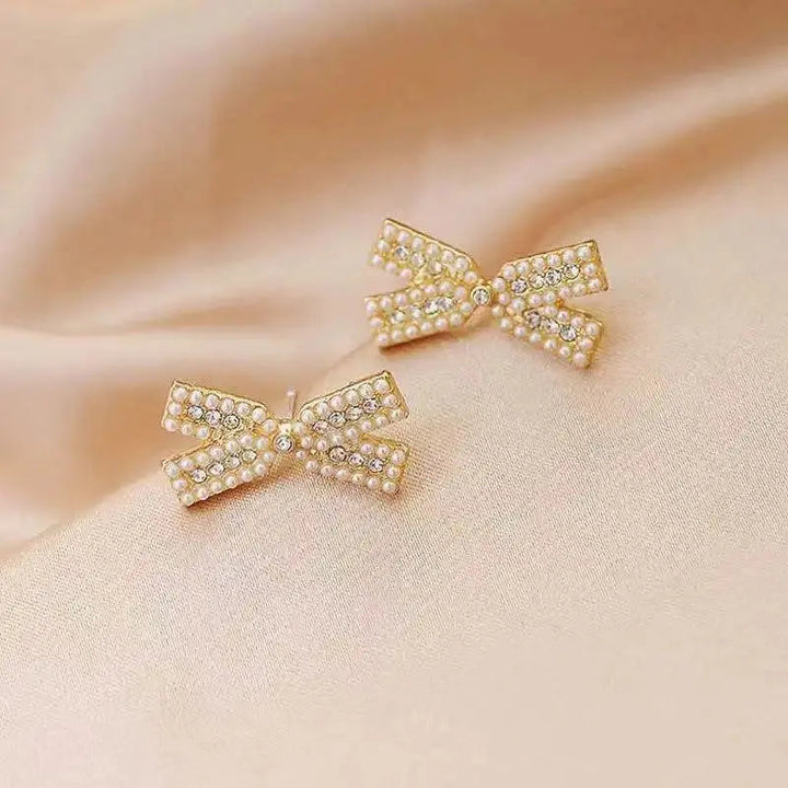 Cross Bow Diamond Studs