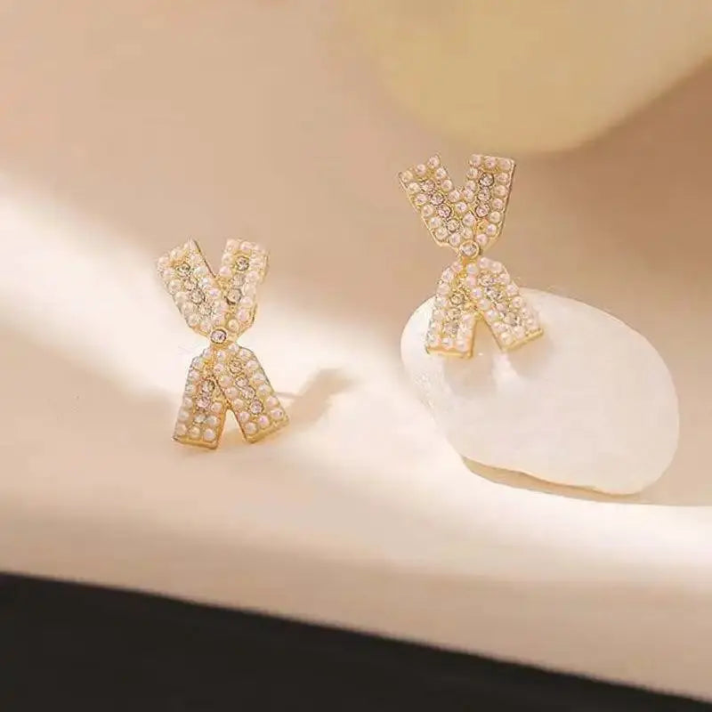 Cross Bow Diamond Studs