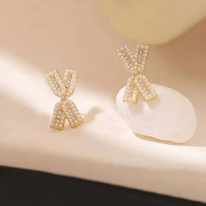 Cross Bow Diamond Studs