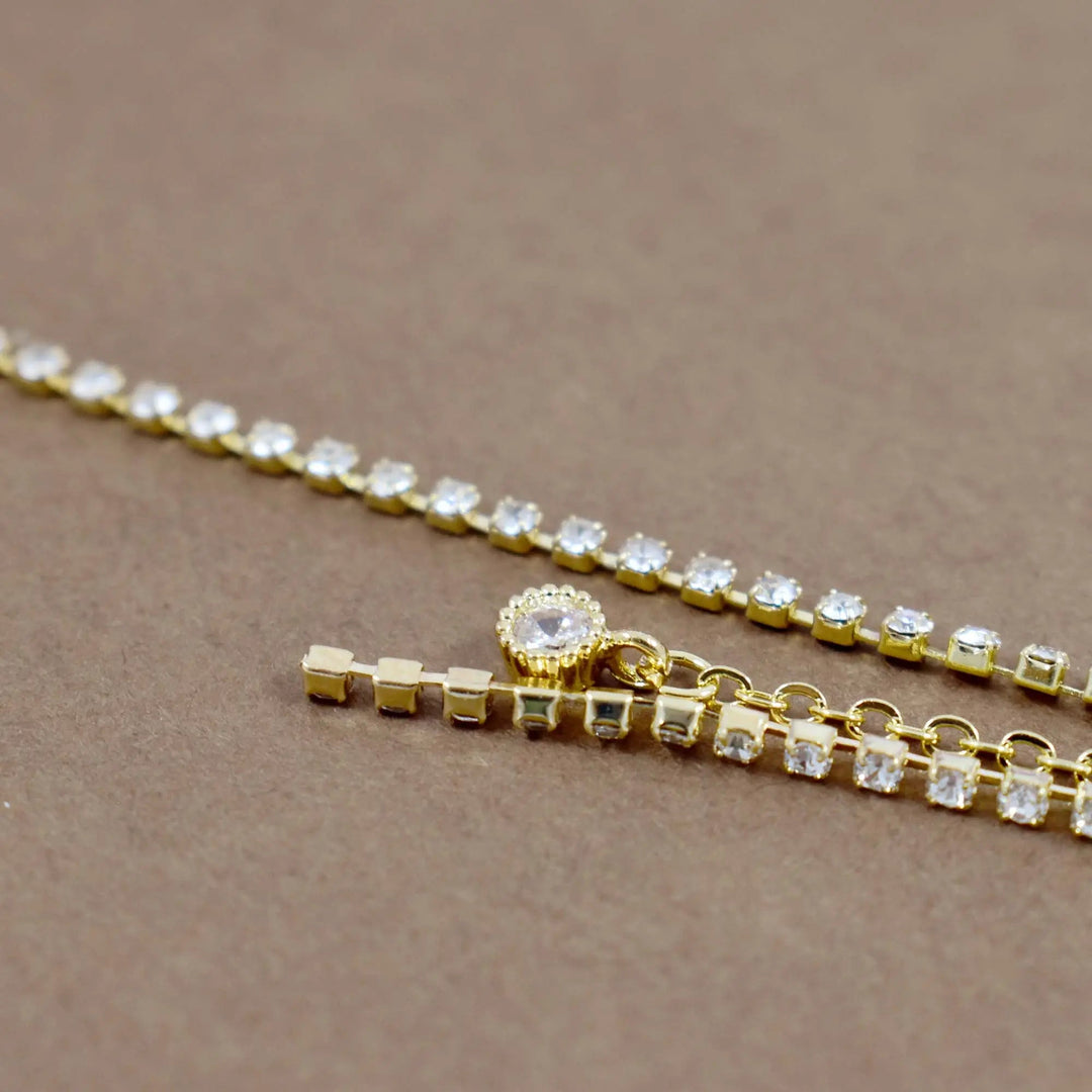 Crystal flower arched long drop gold earrings - Salty Accessories