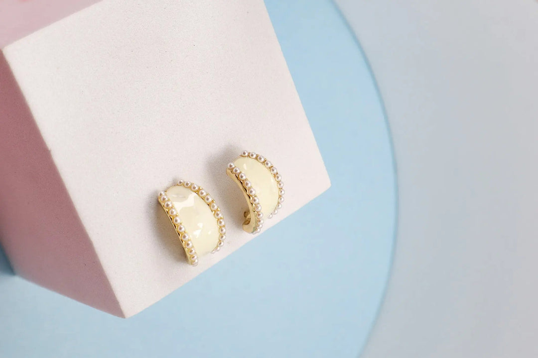 Curved White Spotted Earrings