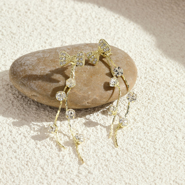 Lusty Bow Tassel Earrings
