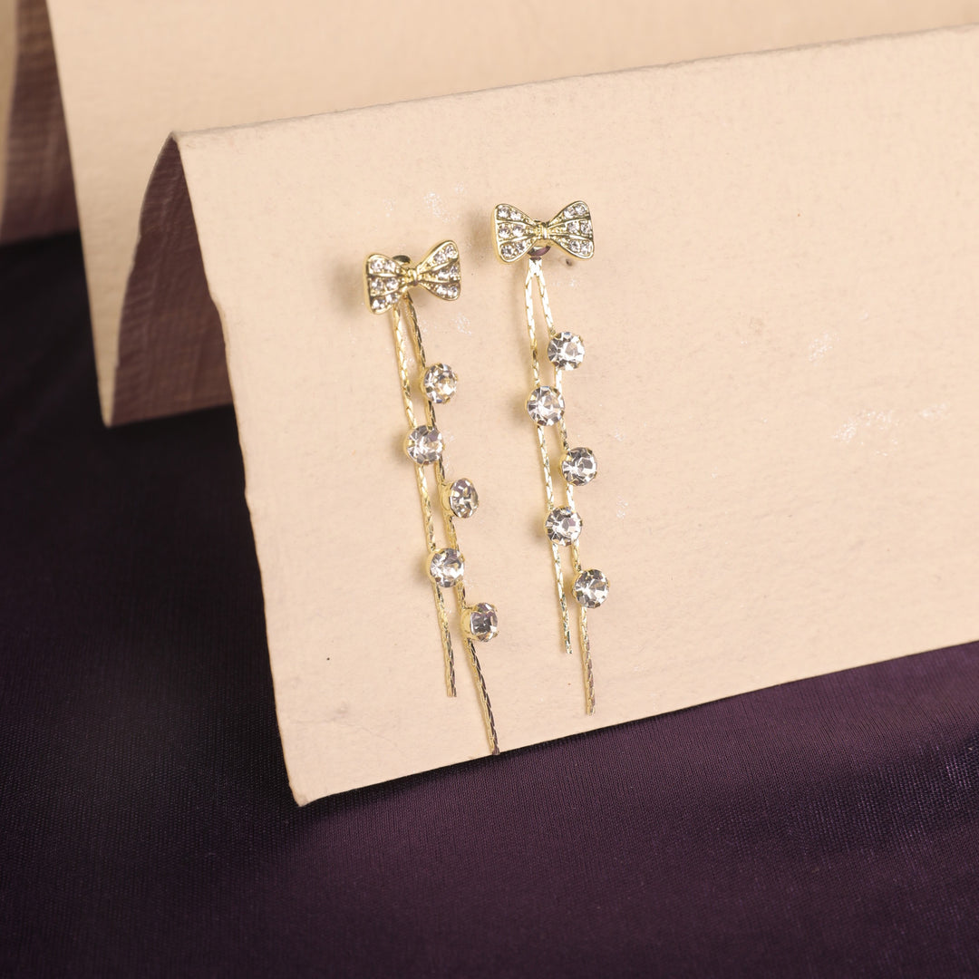 Lusty Bow Tassel Earrings