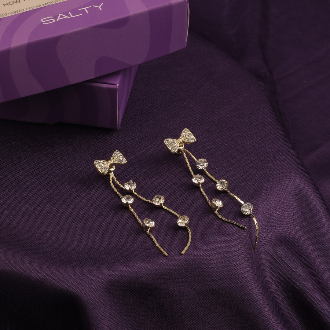 Lusty Bow Tassel Earrings