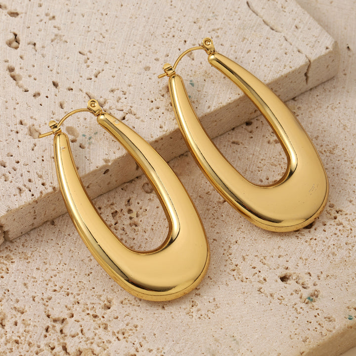 Extended Oval Gold Earring