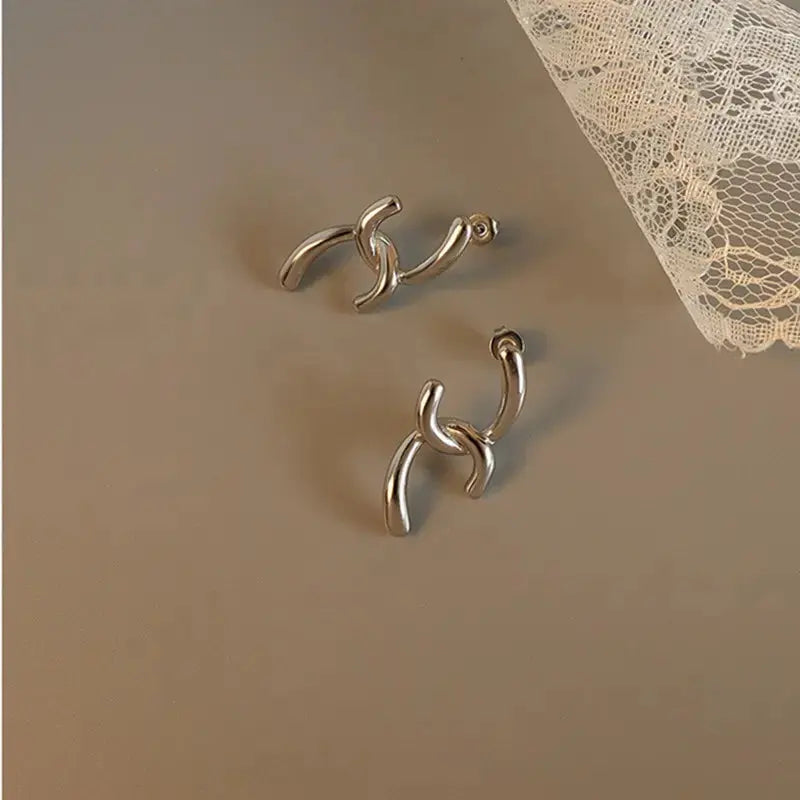 Intersecting Silver In Trend Earrings