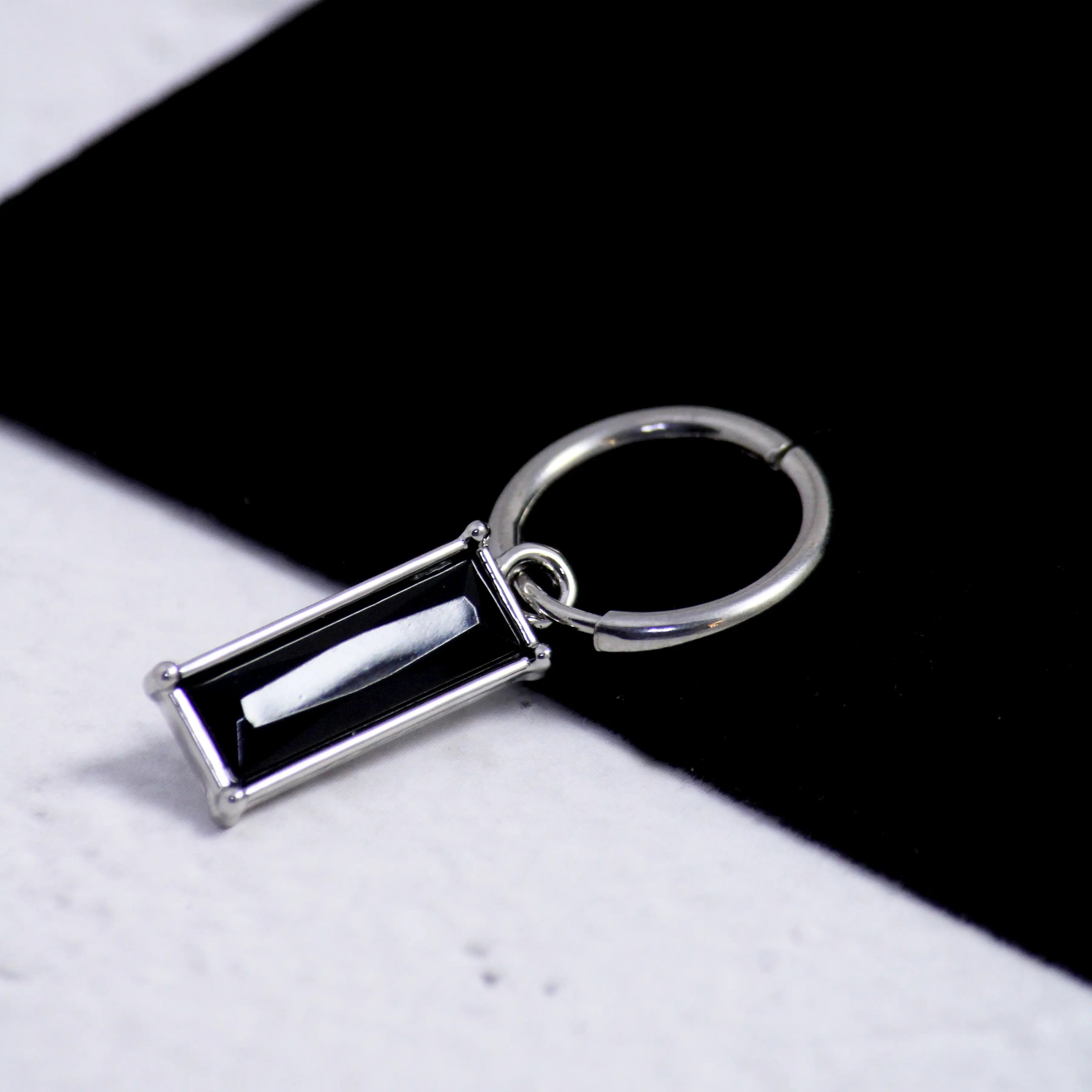 Jaunty Black Earrings (1 Side)