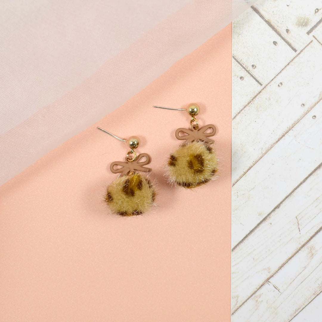 Leopard print fur ball brown bow drop earrings - Salty Accessories
