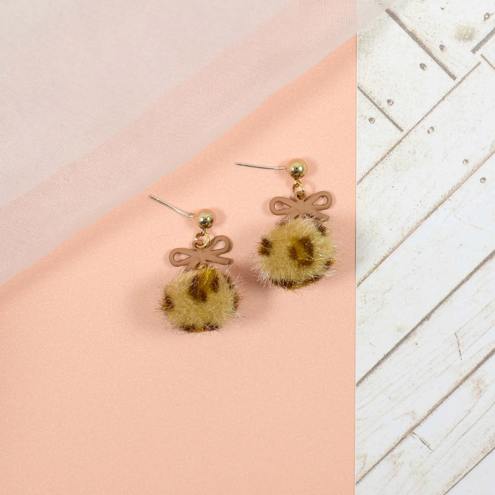 Leopard print fur ball brown bow drop earrings - Salty Accessories