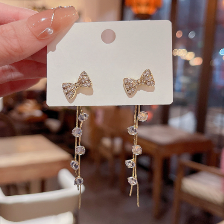 Lusty Bow Tassel Earrings